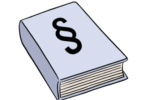 Ein Gesetzesbuch mit Paragraphen.