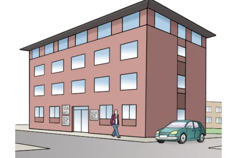 Bürogebäude an einer Straße mit Auto