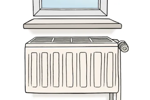 Eine Heizung unter einem Fenster mit Fensterbrett