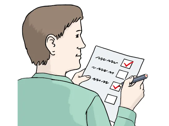 Eine Person schaut auf eine Liste. Sie kontrolliert, was schon fertig ist.